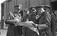 Weichs (third from left) with Johannes Blaskowitz (right, holding map) in Warsaw during the invasion of Poland, 1939