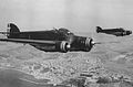 Трехмоторные бомбардировщики Savoia-Marchetti S.M.79. Хорошо виден белый крест на киле и знак фюзеляжа на центральном моторе
