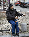 Исполнитель на музыкальной пиле на улице Праги