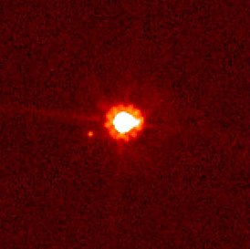 Снимок Эриды со спутником, сделанный при помощи телескопа «Хаббл»