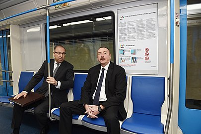 Заур Гусейнов и Ильхам Алиев в вагоне поезда соответственно