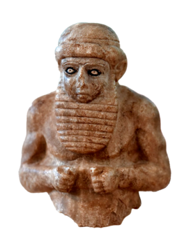 Верхняя часть туловища серой алебастровой статуэтки жреца. Найдена внутри глиняного сосуда в древнем городе Урук археологической экспедицией из немецкого Восточного общества в 1929—1930 годах. Вероятно, она была захоронена после того, как её разбили. Высота составляет около 21 см. Экспонируется в Иракском музее в Багдаде