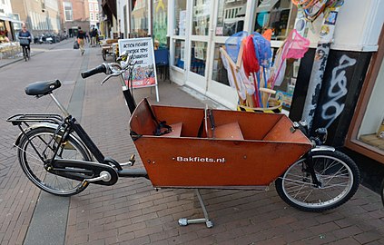 Велосипед на двух или трёх детей пассажиров