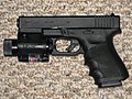 Glock 23 с тактическим фонарём и ЛЦУ