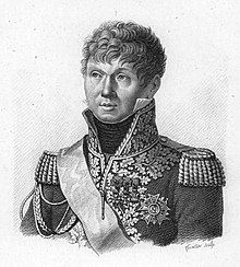 Black and white print shows a clean-shaven round-faced man. He wears a dark military uniform of the early 1800s with epaulettes, a high collar and a lot of lace.