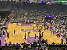 Several players shooting in an emptied stadium