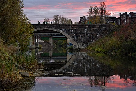 Старый мост через Ижору, вид на Ижорский завод, рядом стык улиц Соборной и Загородной