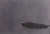 Каяк и нарты на фоне айсберга. Земля Франца-Иосифа, август 1895