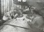 Rest hours on board of Soviet ship Karaganda during the voyage to India. The crew members play dominoes during rest hours. Photo dated 1961 or 1962.