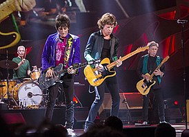 The Rolling Stones во время выступления на фестивале Summerfestruen в Милуоки, 2015 год Слева направо: Чарли Уоттс, Ронни Вуд, Мик Джаггер и Кит Ричардс