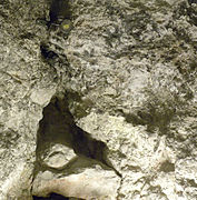 Природный камень Голгофы в часовне Адама ниже места распятия