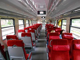 Салон промежуточного вагона дизель-поезда ДР1АЦ-219 с сиденьями 2 класса