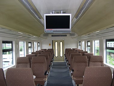 Салон вагона 2 класса с сиденьями по схеме 2+2
