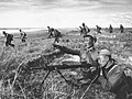 Бойцы монгольской Народно-революционной армии ведут бой с японскими захватчиками из пулемёта ДП. Халхин-Гол. 1939 год