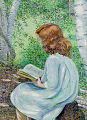 Читающая рыжая девочка