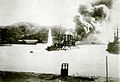 «Паллада» под обстрелом в гавани Порт-Артура, справа броненосец «Победа» 1904 год
