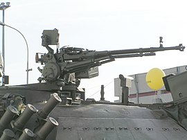 Внешний вид пулемёта румынского производства, установленного на крыше башни танка TR-85M1 (вид сбоку)