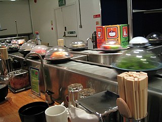 Суши-конвейер YO! Sushi[en] в Сохо