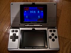 Neo Double Games приставка-клон DS, однако с примитивным и сегментированным LCD-экраном.