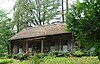 The Pioneer Mothers Memorial Cabin Museum, a single-story log cabin.