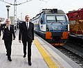 ВЛ11М6-507 - один из последних электровозов, выпущенных на ТЭВЗе в 2015-м году. Рядом с электровозом - Президент Азербайджана Ильхам Алиев, станция Баку-Пассажирская.