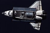 Шаттл «Дискавери», сфотографированный с Международной космической станции.