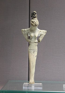 Убейдская глиняная статуэтка из Ура с характерной рептилиеобразной внешностью.