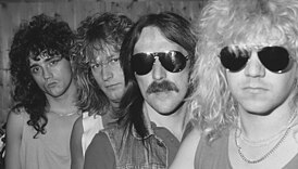 группа в 1987 году, слева направо: Маттиас Дит, Герхард Шлейфер, Берни ван дер Граф, Мэт Синнер.