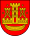 A coat of arms depicting a golden castle with three turrets surrounded with four golden stars all on a red background