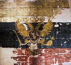 В первоисточнике[5] изображение зеркально отображено, что лишь подтверждает то, что лицевая сторона флага расположена слева от «древка».
