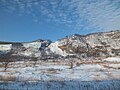 Вид на Барановский вулкан зимой из окна поезда