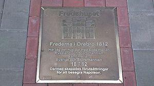 Мемориальная табличка на месте здания, где был подписан мирный договор