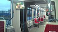 Салон трамвая 71-801 (Alstom Citadis 301 CIS) с установленными считывателями бесконтактных смарт-карт. 2015 год