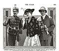 Слева направо: Герберт Баррингтон, Гертруда Астор (впервые на экране) и Эл Гарсия в фильме «Под двумя флагами» (1915)