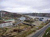 Одни из первых каменных домов в городе. Вид на гавань и корабли.